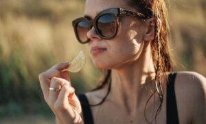 Woman eating chips