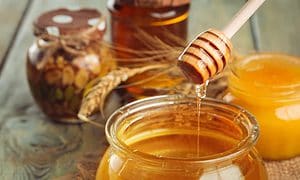 Sweet honey in glass jar