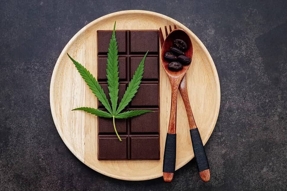 cannabis leaf with dark chocolate and fork