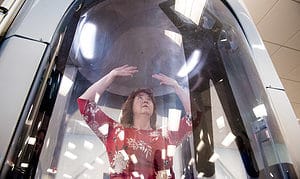 woman in airport scanner