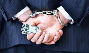 businessman in handcuffs